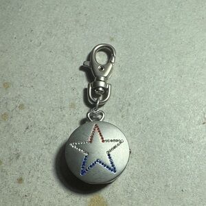 VINTAGE 1980 Hilton Silver Star Keychain with Red and Blue Accents